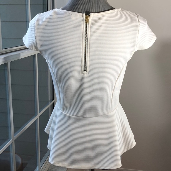 Striking Architectural Peplum Top - Picture 5 of 10